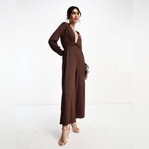 ASOS DESIGN textured jersey jumpsuit with twist front in brown
